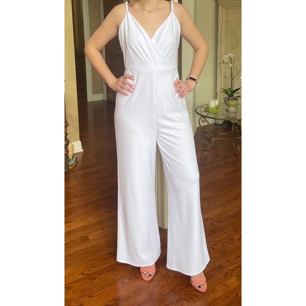 Francesca’s white chiffon jumpsuit